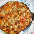 Pizza de champiñón, tomates cherry y nueces,[...]