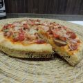 Pizza de masa integral de jamón york, bacon,[...]