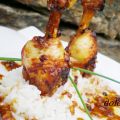 Alitas de pollo con salsa agridulce sobre arroz[...]