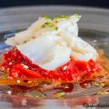 Bacalao confitado sobre piquillos caramelizados