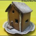 Casita nevada de galleta y galletas de especias