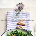 Merluza con tomates confitados
