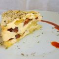 Láminas de patata al vapor con longaniza de[...]