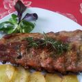 Costillar con miel y romero al horno con[...]