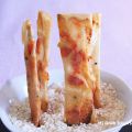 Crujiente de pimiento confitado y queso con[...]
