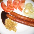 Salchichas de cerdo con diferentes cebollas