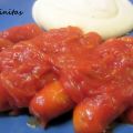Salchichas encebolladas con tomate