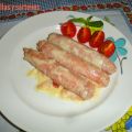 Salchichas con salsa de nata y bacon