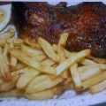 cordero asado con patatas fritas