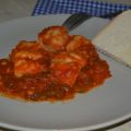 Merluza en fritada de tomates