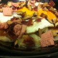 Huevos rotos con jamón, shiitake y foie