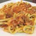 Fettuccine ai funghi porcini con carne y tomate