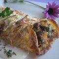 Crep  de carne picada gratinado con bechamel.