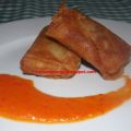 Rollitos de manitas de cordero con salsa[...]