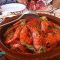 CONEJO ENCEBOLLADO Y GAMBAS