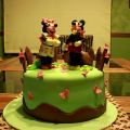 Minnie y Mickey en el campo. Tarta para un[...]
