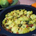 Patatas y verduras con queso gratinado