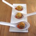 Bolitas de mozzarella rebozadas sobre salsa de[...]