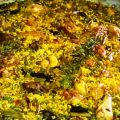 Paella valenciana, con pollo, conejo y verduras.
