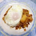 Patatas revolconas con huevo roto