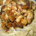 Pasta con champiñones y gambas