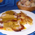 Paletilla de cerdo asada a las finas hiervas.