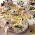 Merluza en salsa verde con almejas en vinagreta.
