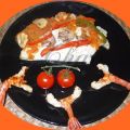 Rodaballo con salsa de tomate con champiñones.