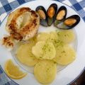 Sepia plancha con mejillones y patatas con piel
