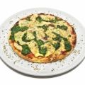 Pizza de espinacas con piñones y pasas