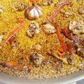PAELLA A LA LEÑA DE POLLO Y CONEJO