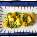 Patatas al curry con guisantes y gambas