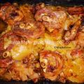 Confit de cordero en lecho de patatas y cebolla