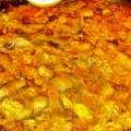 Paella con pulpo de roca y alcachofas