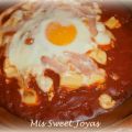 Huevos al plato a los tres quesos