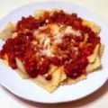 Raviolis con salsa boloñesa