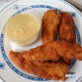 Solomillos de pollo con salsa de miel y mostaza