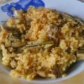 Arroz con secreto, alcachofas y ajos tiernos