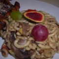 Fideua de champiñones con higos y uvas al WOK