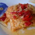 Bacalao con cebolla y pimientos rojos