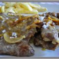 Secreto ibérico con salsa de naranja