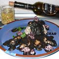 Chipirones con salsa de tinta de sepia y arroz.