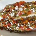 Japuta al horno con pimientos y queso feta