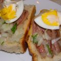 Huevo sobre anchoa con cebolla y perejil en tan[...]
