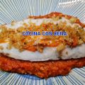 Merluza en cama de tomate, con picada de[...]
