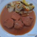 Solomillo de cerdo adobado en salsa de naranja