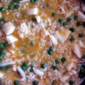 Arroz con sepia y guisantes