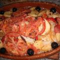 Bacalao con patatas y tomate sobre cama de[...]
