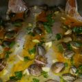 Merluza al horno con chirlas y gambas