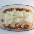 Bacalao con bechamel sobre pisto y patatas